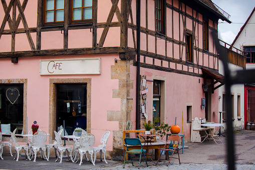 Beautiful open-air cafe on the streets of the fairy tale town of Rothenburg, Germany
