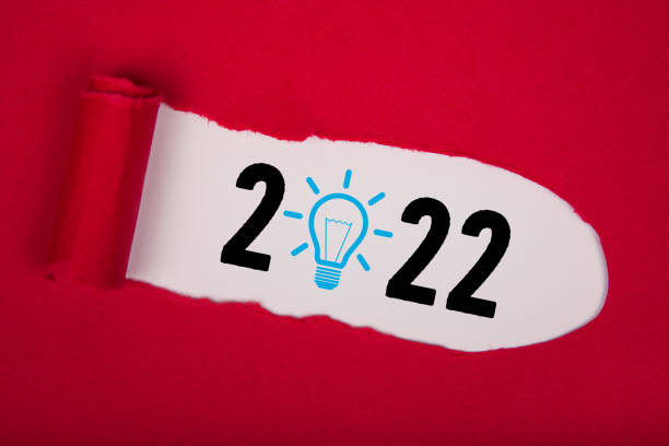 istock Torn Paper With New Year 2022 Idea Concepts On White Background 1358610630