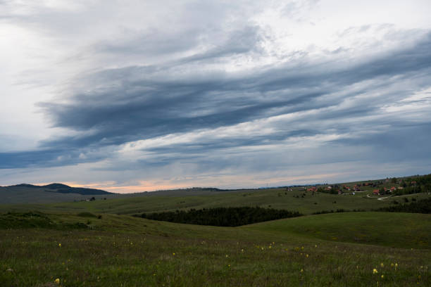 istock Stormy clouds covering the evening sky. 1358616752