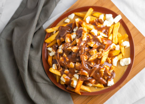 istock The original poutine with fresh cheese curds and hot gravy melted cheese to perfection 1358621083