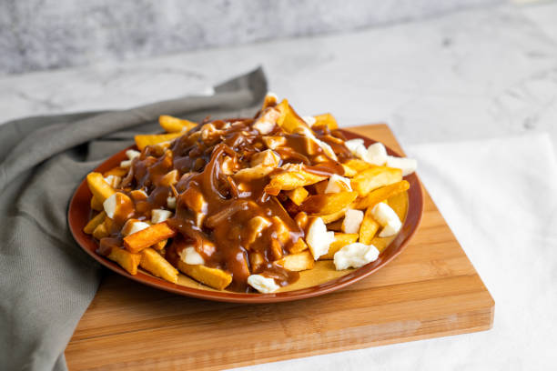 istock The original poutine with fresh cheese curds and hot gravy melted cheese to perfection 1358621089