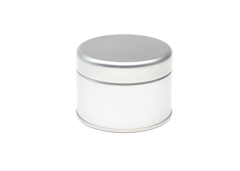Closeup of a generic, silver tin canister on a white background.