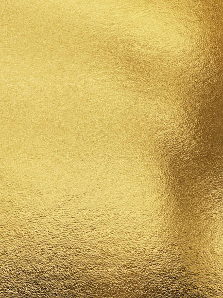 istock Golden shiny texture shadow. Shimme leather background 1358622599