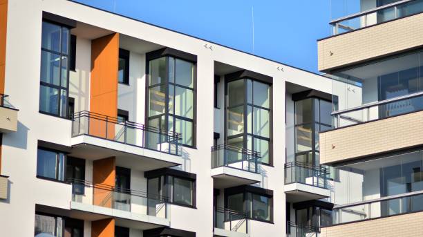 istock Modern apartment building in sunny day. 1358628122