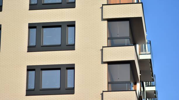 istock Modern apartment building in sunny day. 1358628247