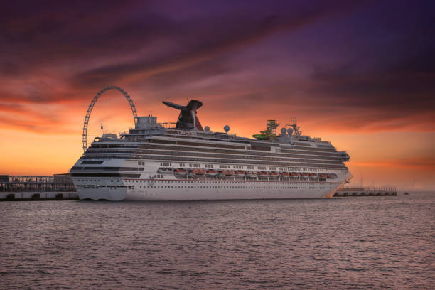 Cruise liner standing on anchor at Marina Beach near Palm Jumaira island. Carnival Cruise Lines. Carnival splendor cruise ship