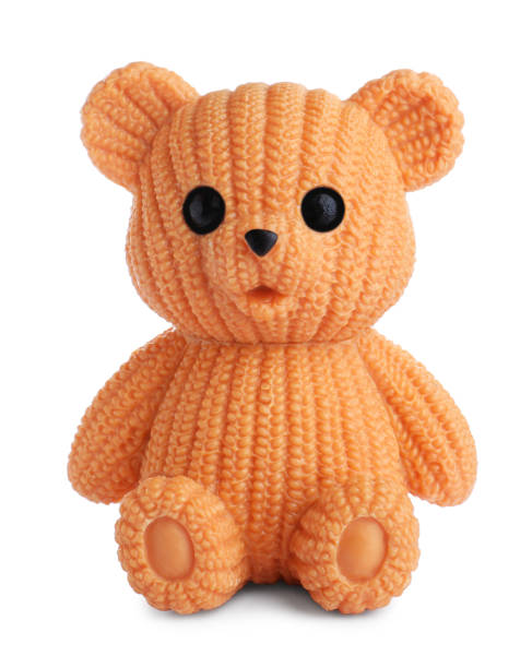 istock Adorable orange toy bear isolated on white 1358629558