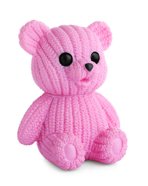 istock Adorable pink toy bear isolated on white 1358629562