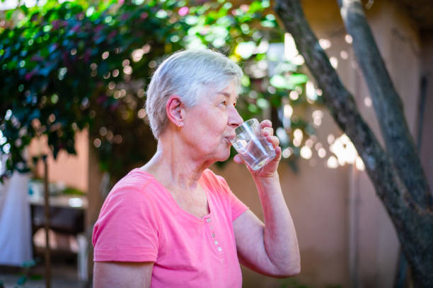 istock Woman drinking water. 1358630895