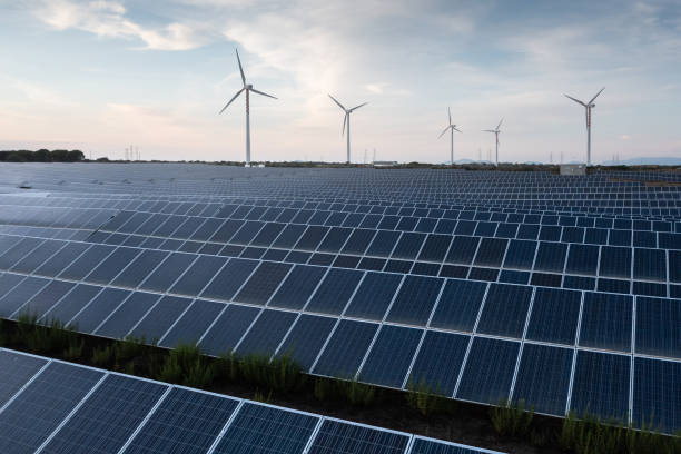 istock Solar and wind energy for clean environment 1358631278