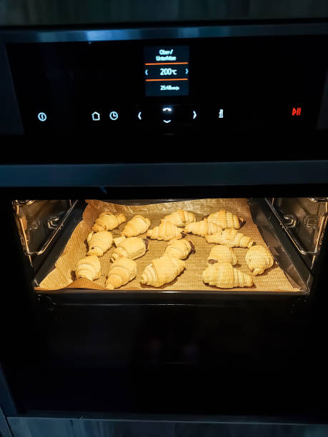 istock Bake croissants filled with chocolate in the oven 1358632364