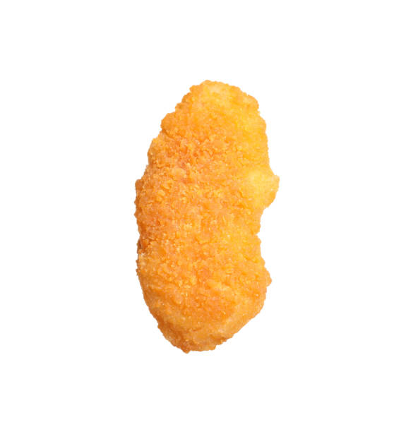 istock Delicious fried chicken nugget isolated on white 1358633975