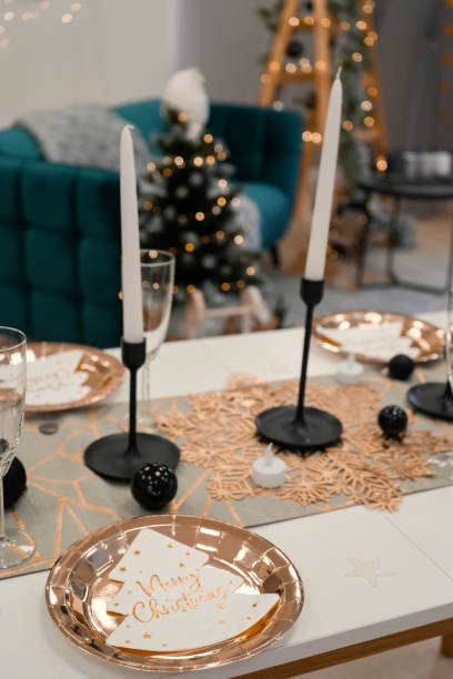 istock Christmas table setting with disposable plates and cups 1358635197