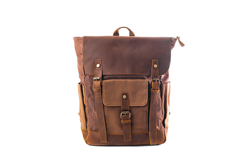 Brown leather backpack. Hipster's canvas bag