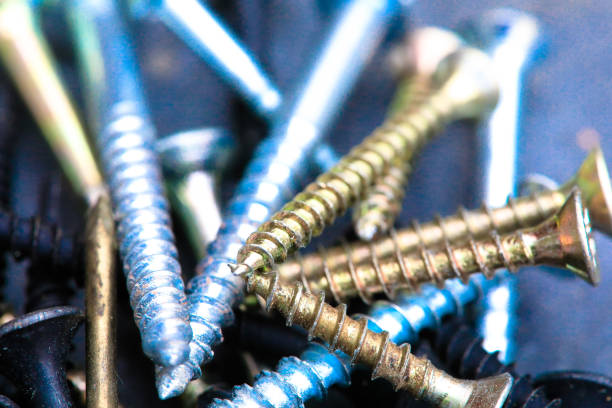 istock Different Kind of Screws on a table in a workshop 1358636490
