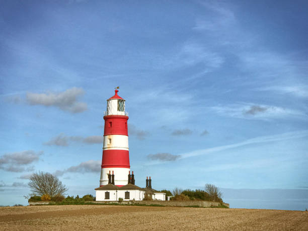 istock Happisburgh lighthouse in Norfolk, UK 1358641566