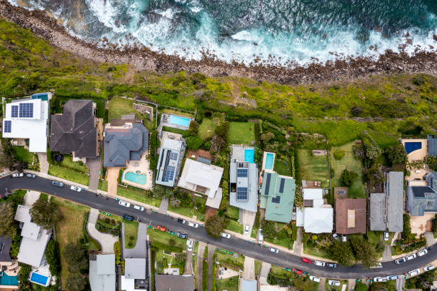 istock Coastal Suburb overhead perspective roof tops 1358641590