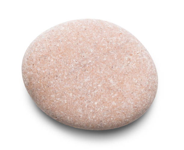 istock Pebble. Smooth red  sea stone isolated on white background with shadows, clipping path  for isolation without shadows on white 1358643464