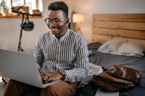 istock Man working on laptop at home 1358643734