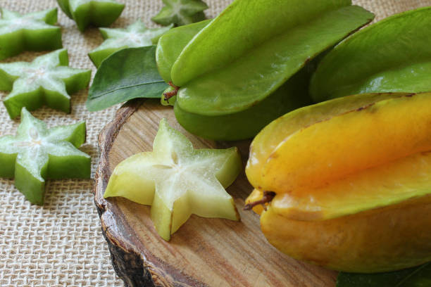 istock Tasty carambola fruit on wooden table. 1358645259