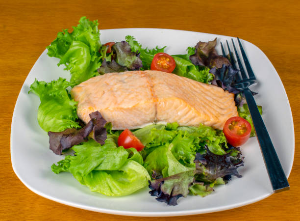 istock baked salmon on a salad 1358648799