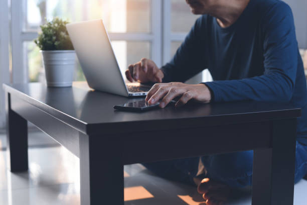 istock Working on laptop at home office 1358652638