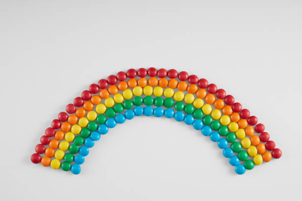 istock Assortment Of Multicolored Candies Over White 1358655373