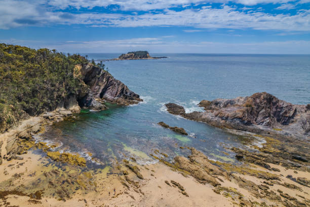 istock Daytime Aerial Seascape and Rock Formations 1358658681
