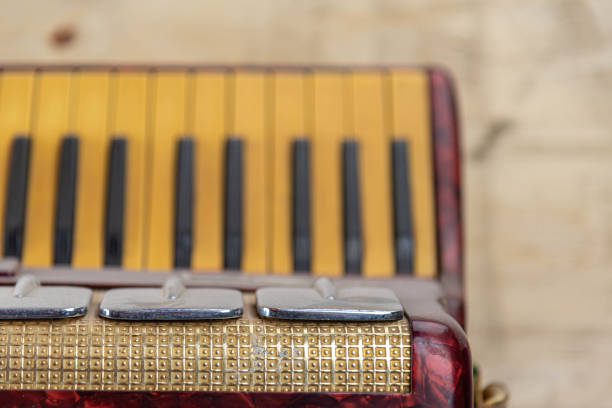 istock Old red accordion covered with dust 1358665081