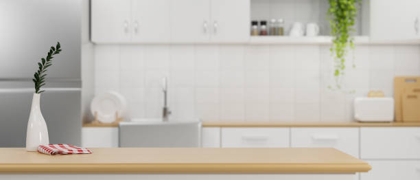 istock Wooden kitchen countertop with copy space 1358666589