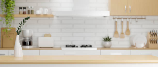 istock Close-up, Wooden kitchen countertop with copy space 1358666597