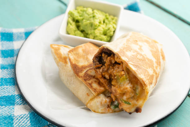 istock Picadillo burrito with beans and cheese. Mexican food 1358667441
