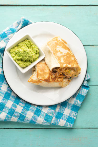 istock Picadillo burrito with beans and cheese. Mexican food 1358667459