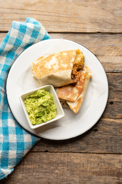 istock Picadillo burrito with beans and cheese. Mexican food 1358667510