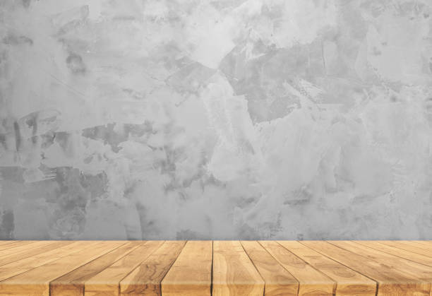 istock Concrete wall and wooden base 1358669381