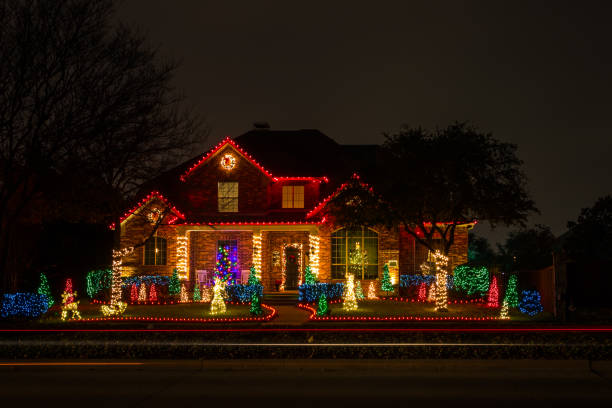 Private residence house illuminated for Christmas Allen, Texas, USA - December 16th, 2021: Private residence house decorated and illuminated for Christmas christmas lights house stock pictures, royalty-free photos & images