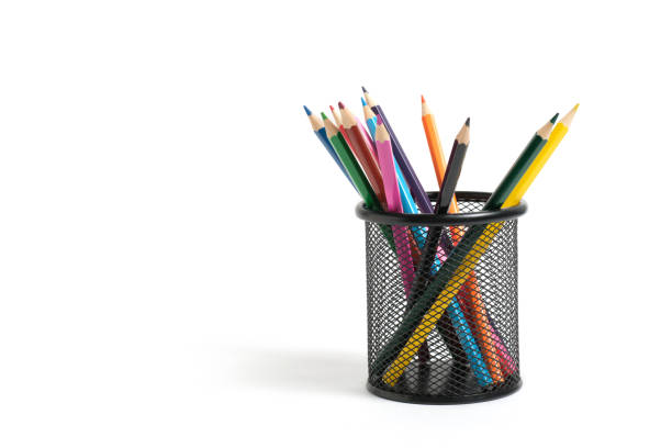 istock Office basket with colored pencils on a white background. 1358670202