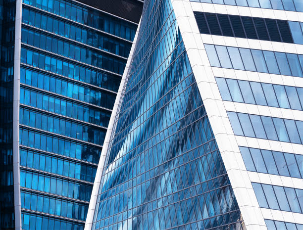 istock Curved shapes of modern skyscrapers background 1358672710
