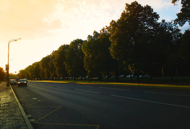 istock Empty autumn city road background 1358680111