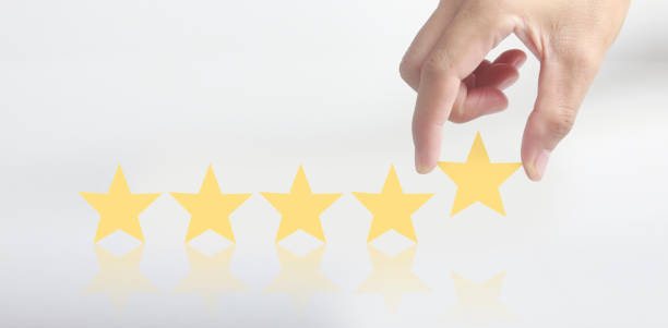 istock Rise on increasing five stars in human hand, Increase rating evaluation 1358680753