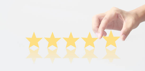 istock Rise on increasing five stars in human hand, Increase rating evaluation 1358680754