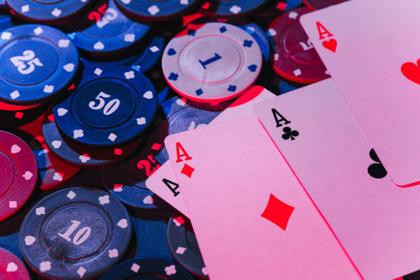 istock playing chips and playing cards close-up. the view from the top 1358693331