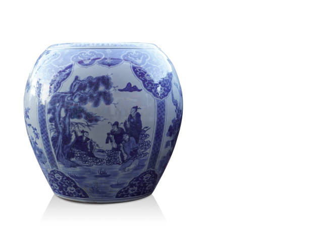 istock Di cut antique blue ceramic jar on white background,object, copy space 1358698549