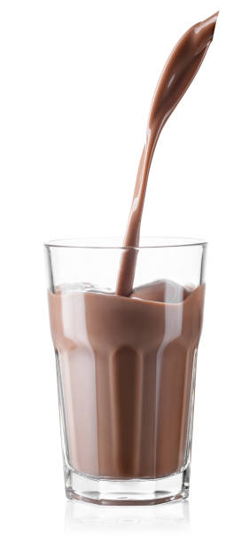 istock chocolate milk or cocoa drink pouring into glass 1358700965