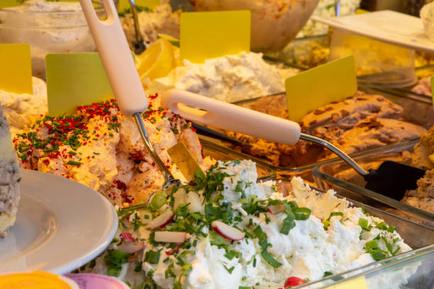 istock Cheese counter with different types of cream cheese 1358700981