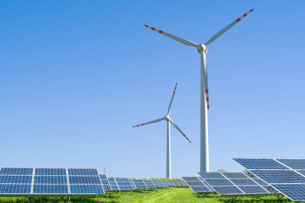 istock solar panels and wind turbines 1358702805