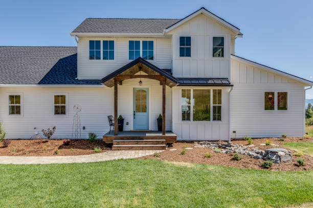 istock Newly landscaped yard with small but beautiful front porch 1358703231