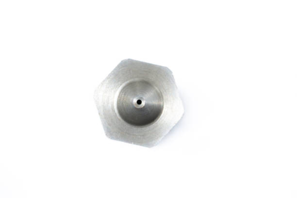istock Macro of a hotend, part of a 3D printer, isolated on a white background 1358705084