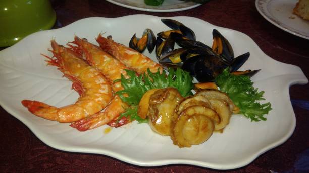 istock Delicious seafood grill on a plate 1358705268