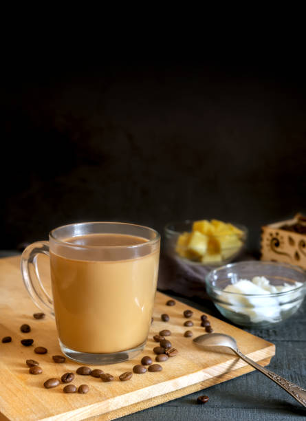 istock Bulletproof coffee: coffee whipped with cream and coconut oil. 1358706560